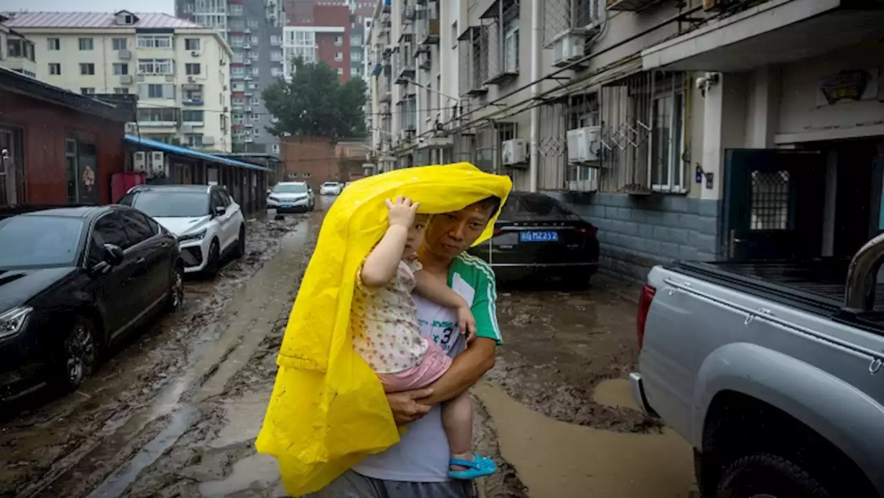 Rain pelts Beijing for fourth day, northern cities on disaster alert - SABC News