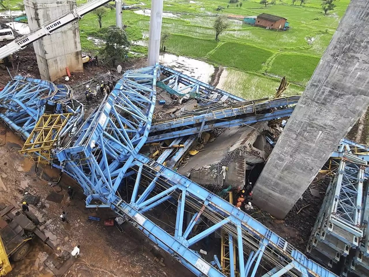 16 workers killed in collapse of crane during India bridge build