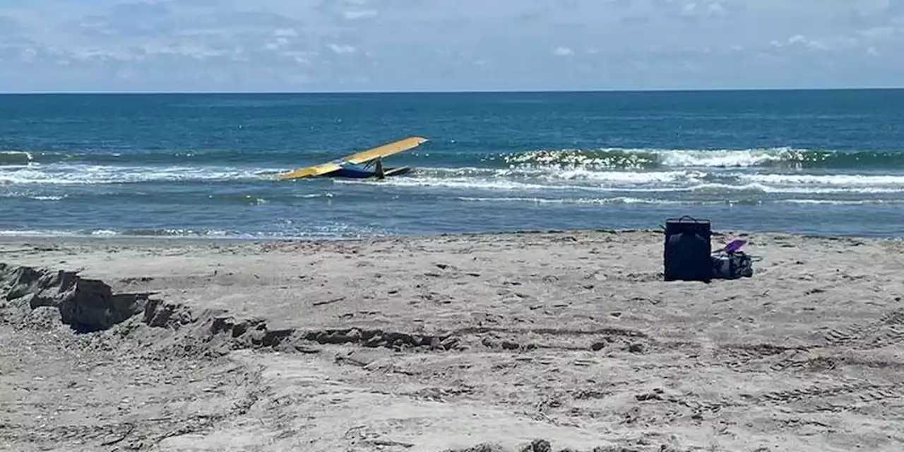 Pilot injured after banner plane crashes into ocean near beach