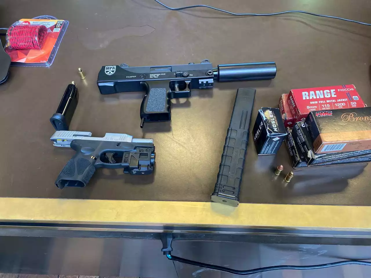 Man arrested with Uzi, pistol and boxes of bullets in bag at Justice Center security checkpoint