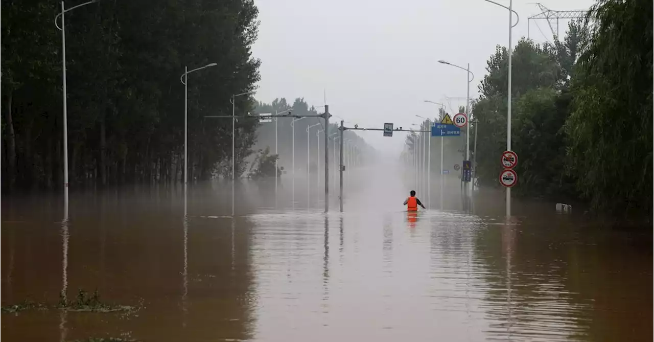 Three killed in China while trying to outrun flash flood