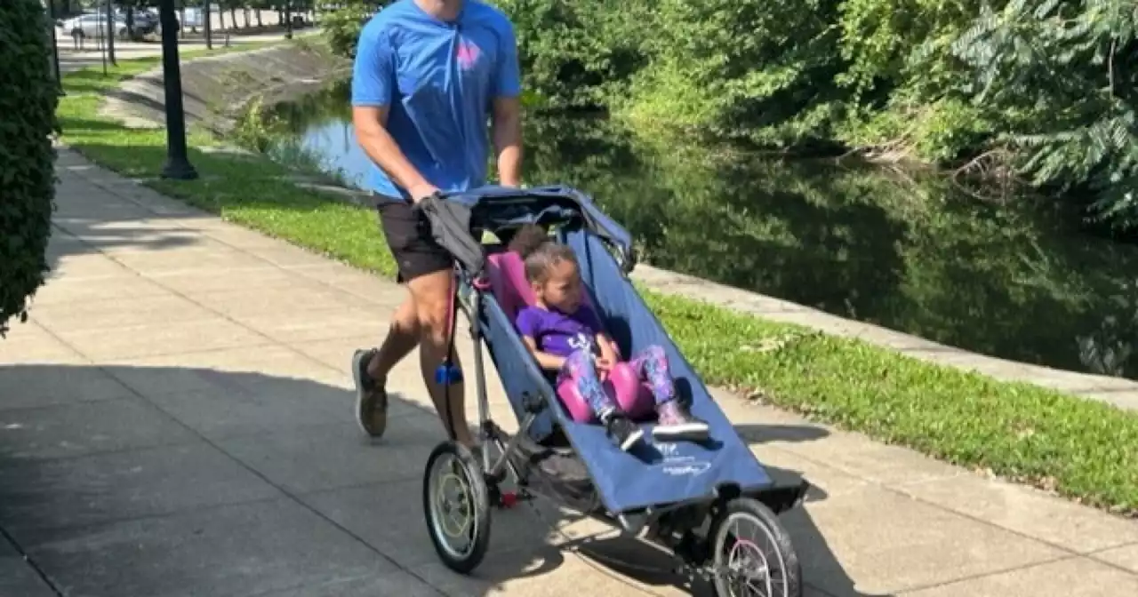 Goodyear employee planning to push niece in wheelchair while running 10K, marathon