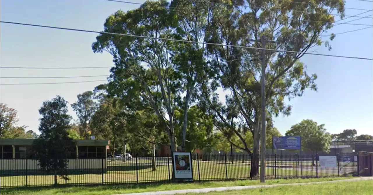 Students run for safety after two armed men enter Melbourne school