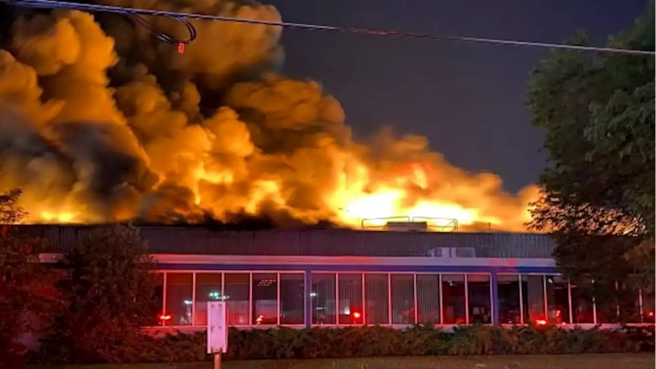 Firefighters battling 'out of control' industrial fire in Etobicoke