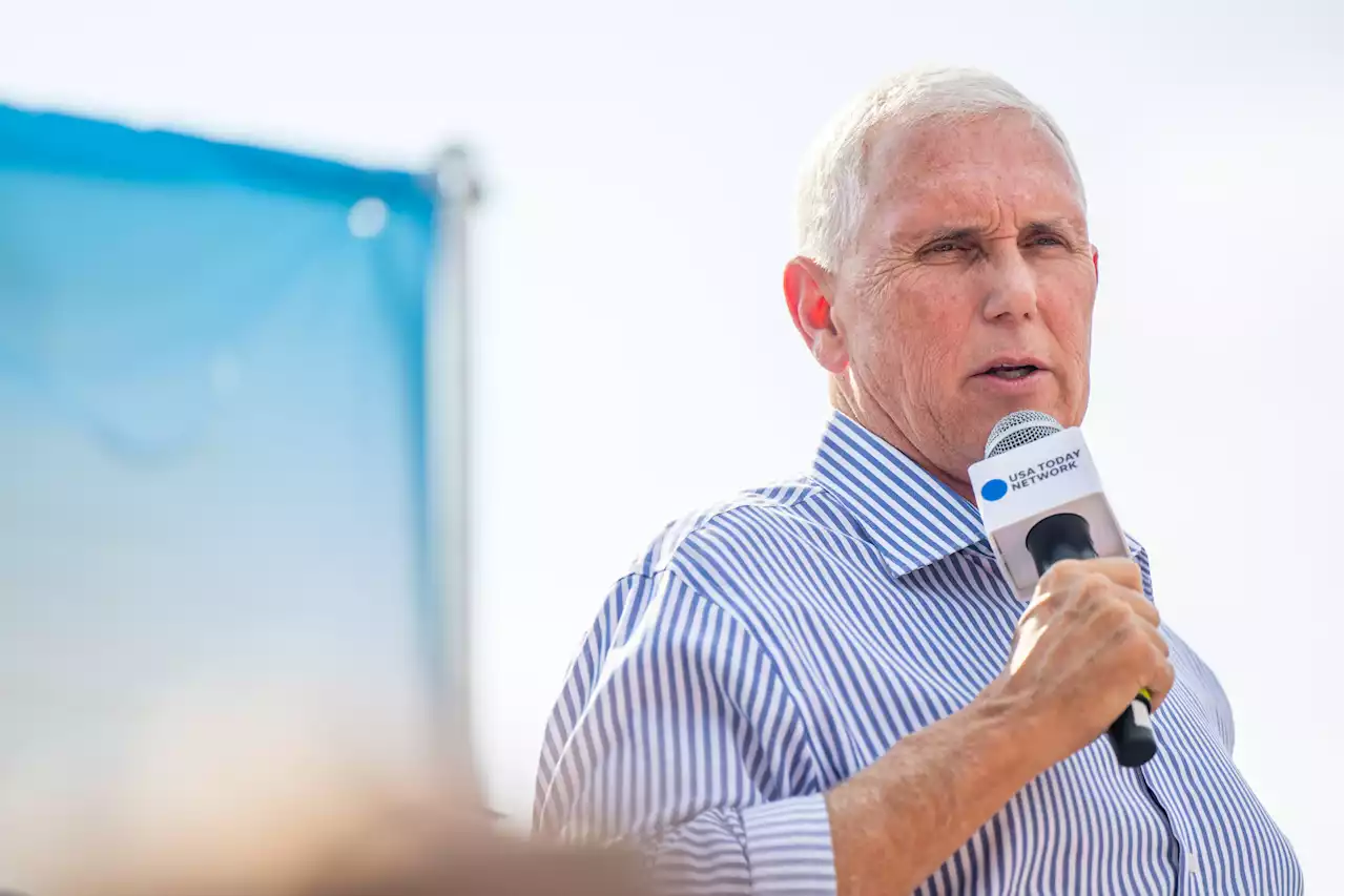 Mike Pence heckled by Donald Trump supporters at Iowa State Fair