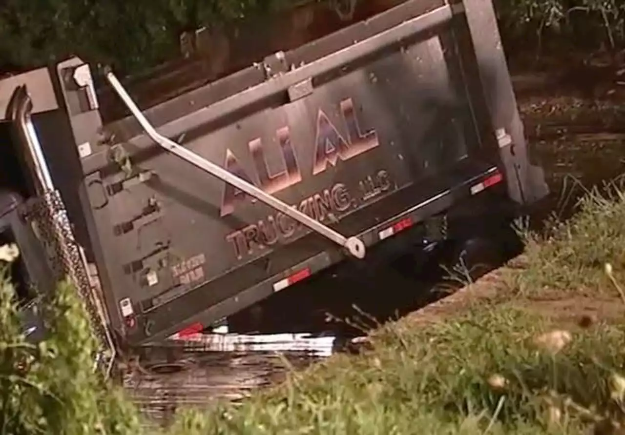 Driver killed, passenger hurt after dump truck runs off road and into N.J. river