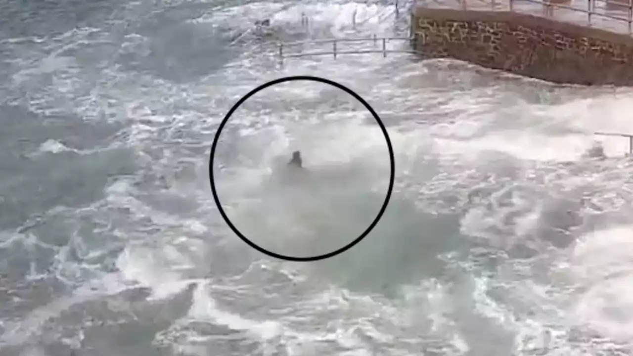 Shocking moment young girl is swept to sea as coastguards issue fresh warning