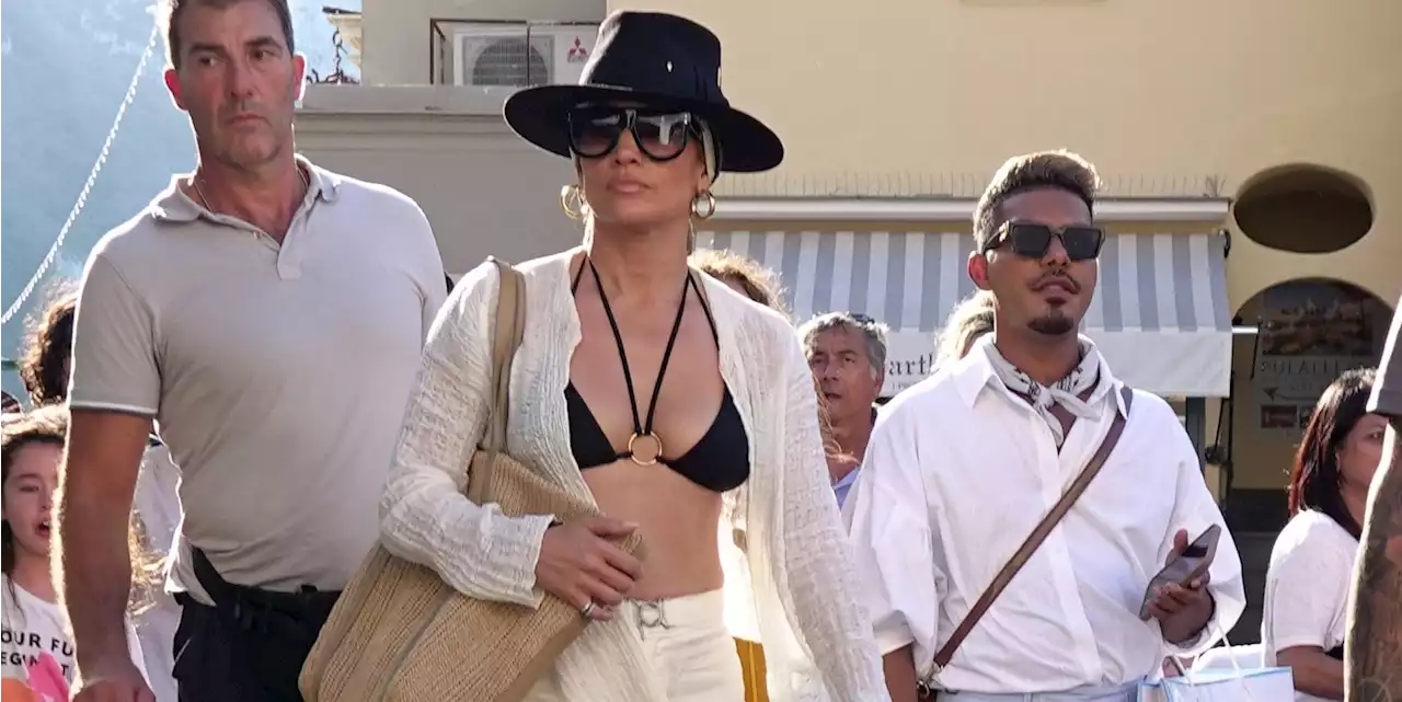 Jennifer Lopez Pairs a Strappy Black Bikini Top with Wide-Leg Pants in Italy