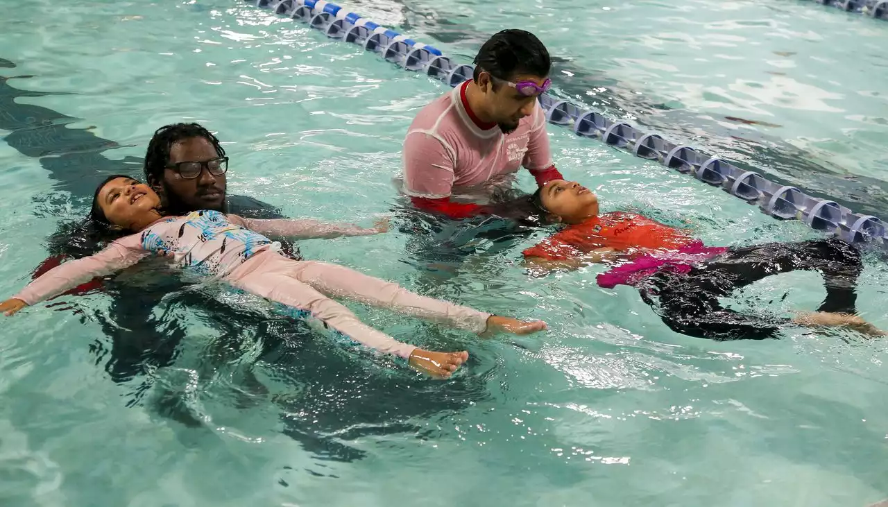 Students learn survival skills at this swim school