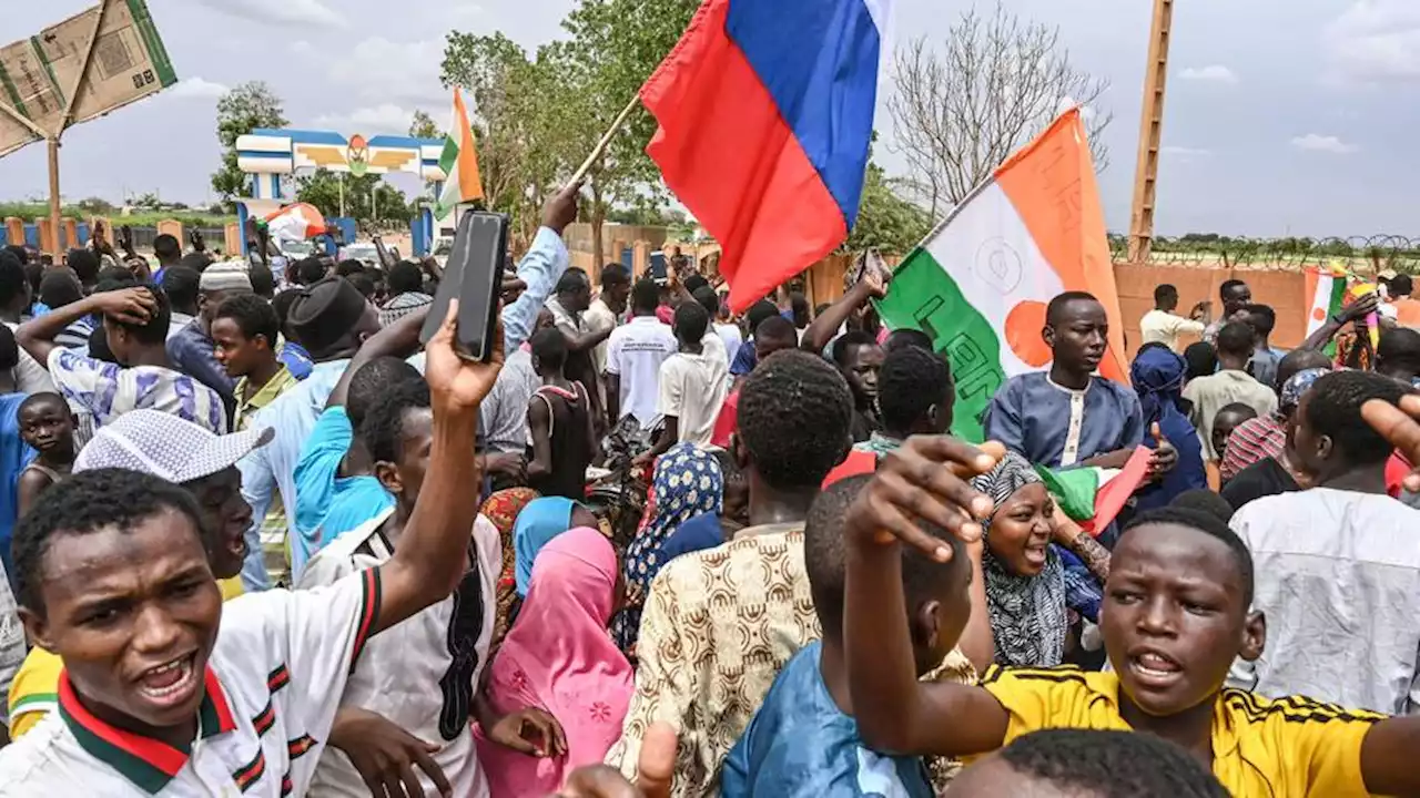 Thousands protest near French base in Niger, some brandishing Russian flags