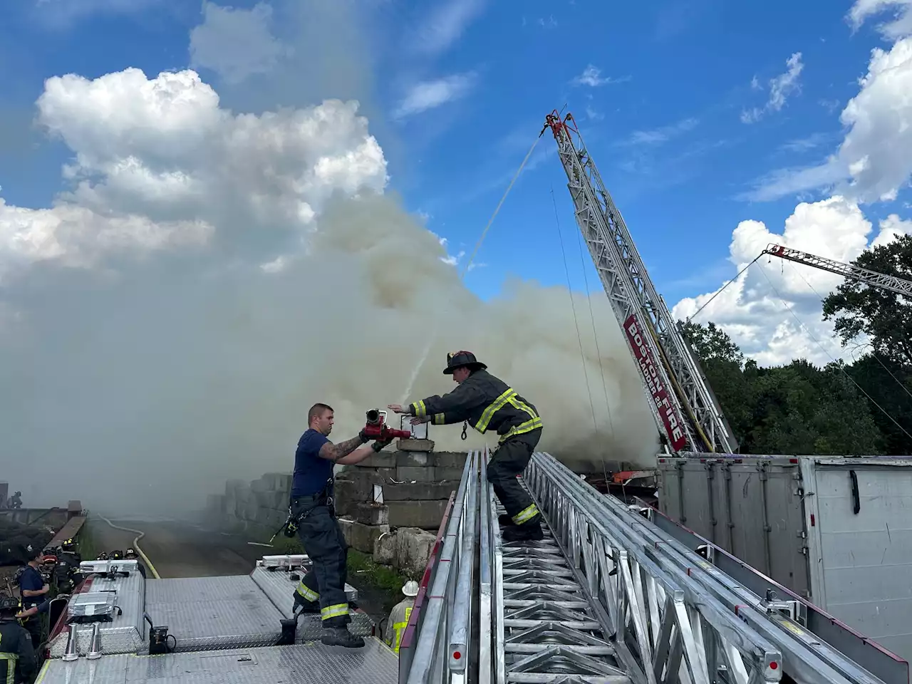 Fire at Boston salvage yard sends smoke high over Hyde Park