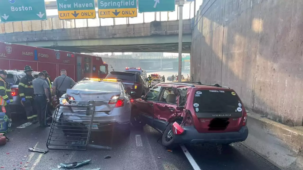 Trooper injured after vehicle strikes police car on I-84 East in Hartford, Conn.