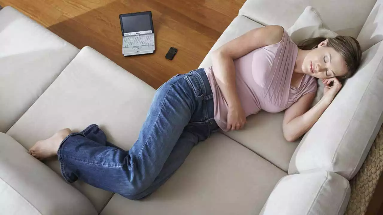 Here's why it might be easier to fall asleep on the sofa than in bed