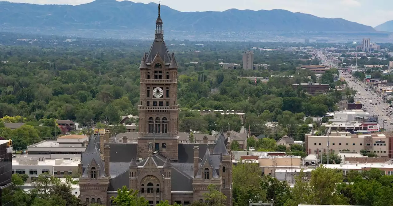 Why do Salt Lake City school board members partially blame the city for potential school closures?