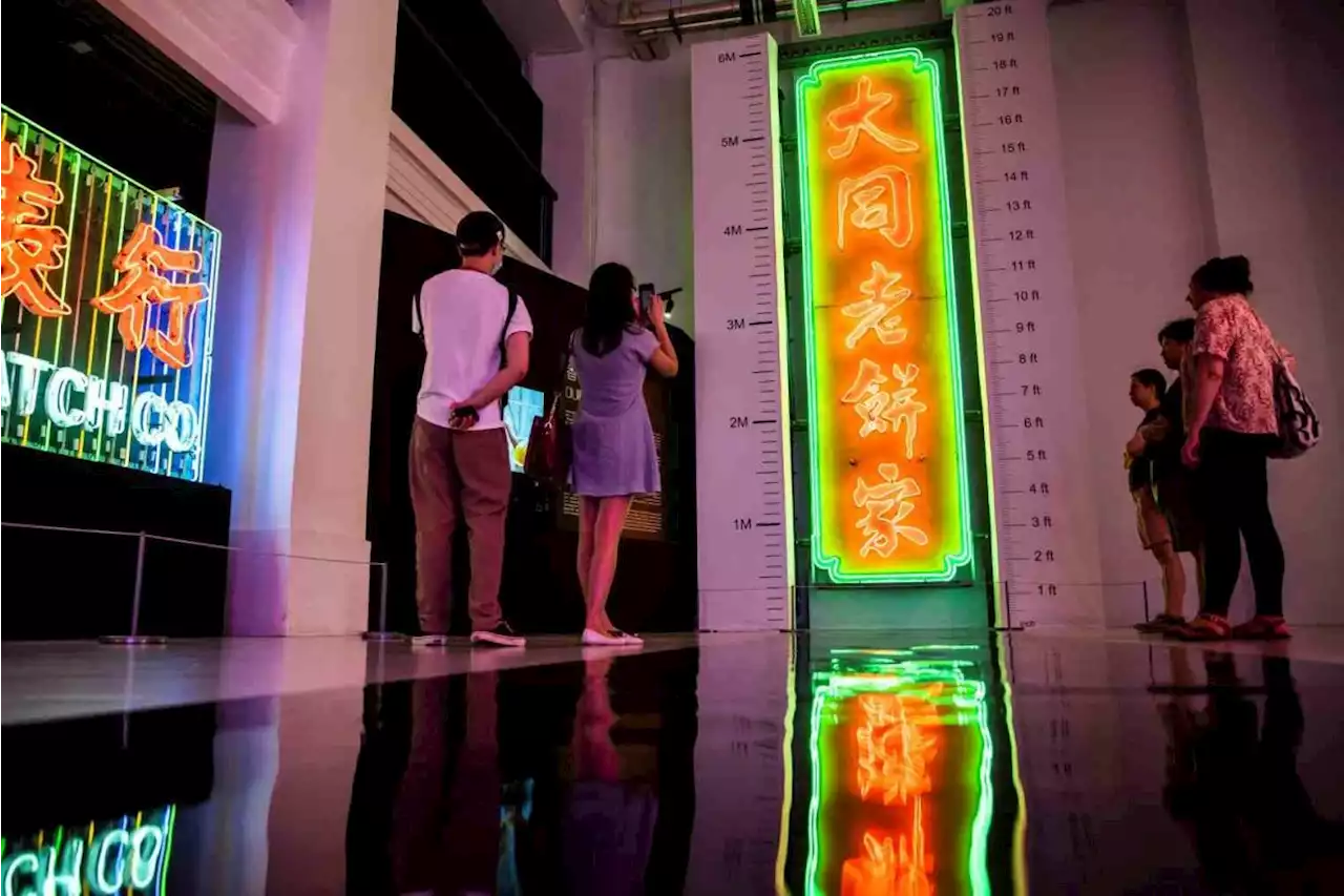 Hong Kong's fading neon signs shine again in exhibit