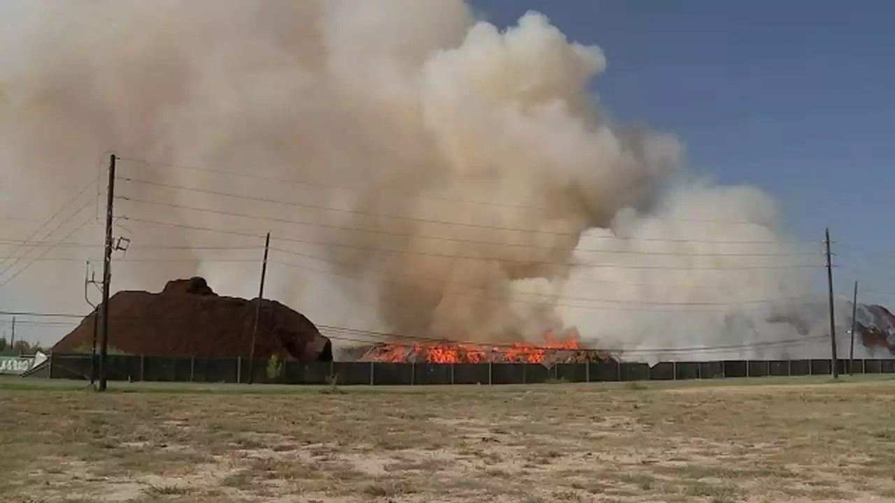 The Houston Fire Department responding to large mulch fire in northwest Houston near Crawford Road