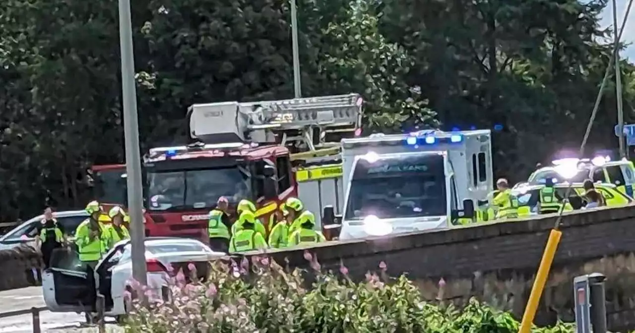 Woman dies after car and lorry crash on Scots road with emergency crews at scene