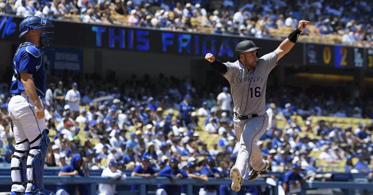 Julio Urías strikes out 12 while the Dodgers rout the Rockies 8-3 for their 8th straight win