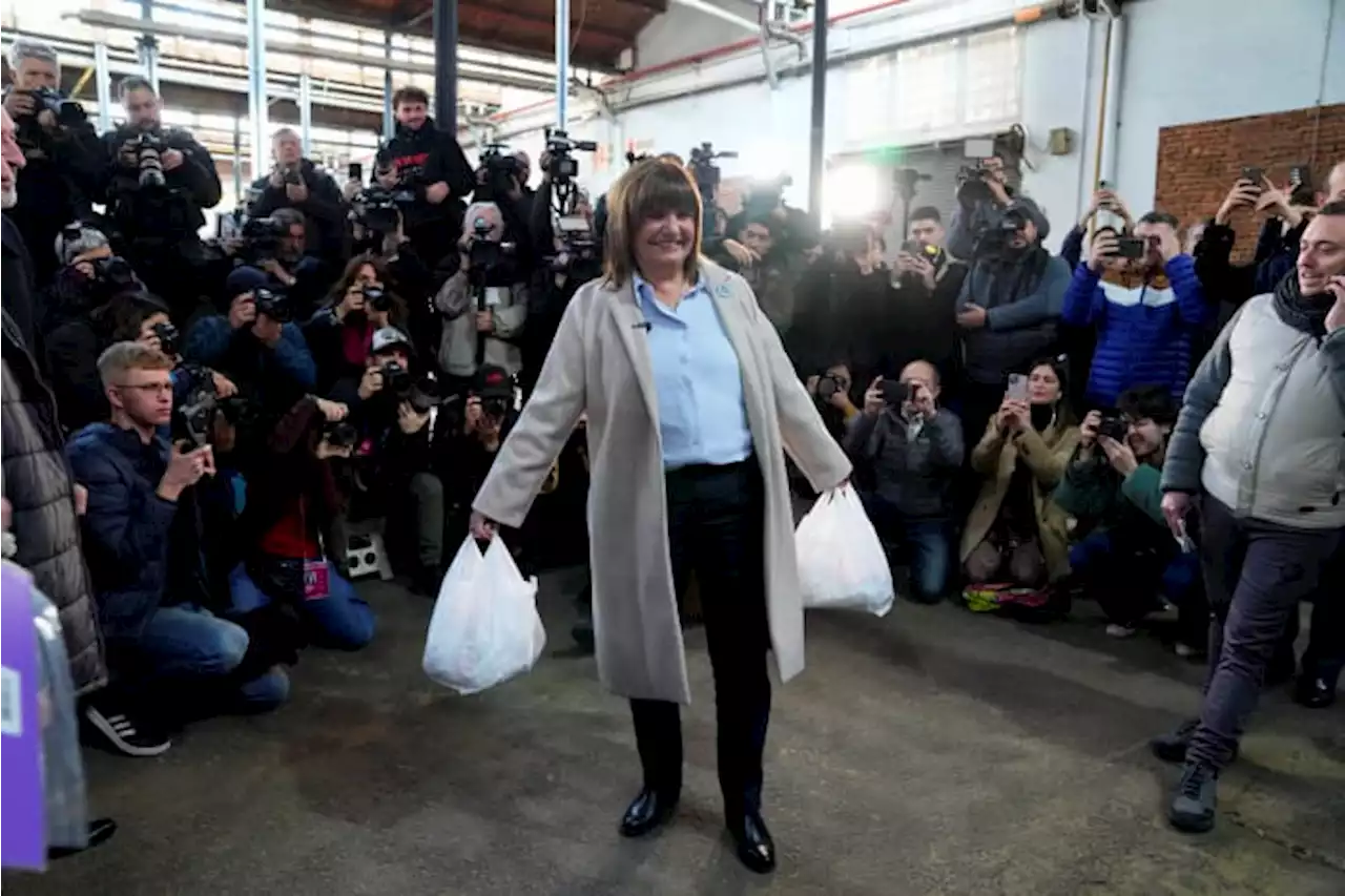 Argentines vote in a primary election that will gauge the yearning for change amid economic turmoil