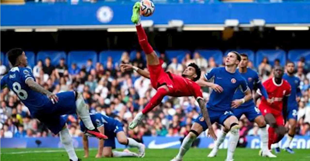 Chelsea and Liverpool share spoils in frantic Premier League opener