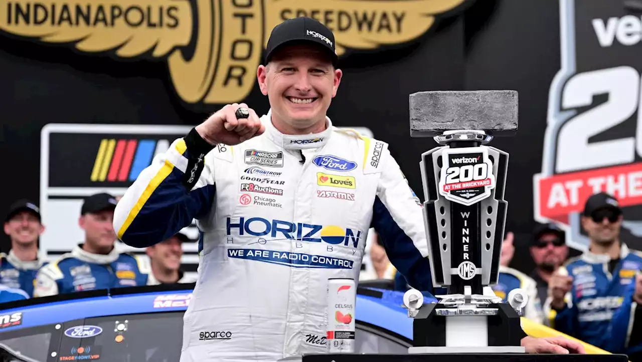 Michael McDowell edges Chase Elliott at Indianapolis to clinch NASCAR playoff berth