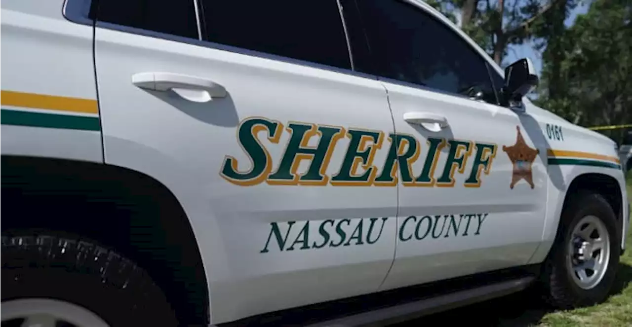 Nassau County deputy responding to call, woman seriously injured in crash