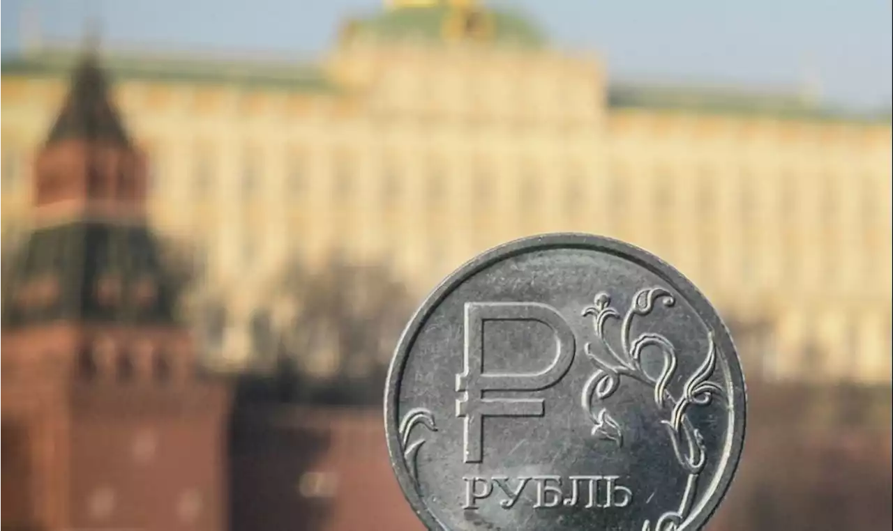 Russian ruble plunges past 100 v dollar for first time since March 2022