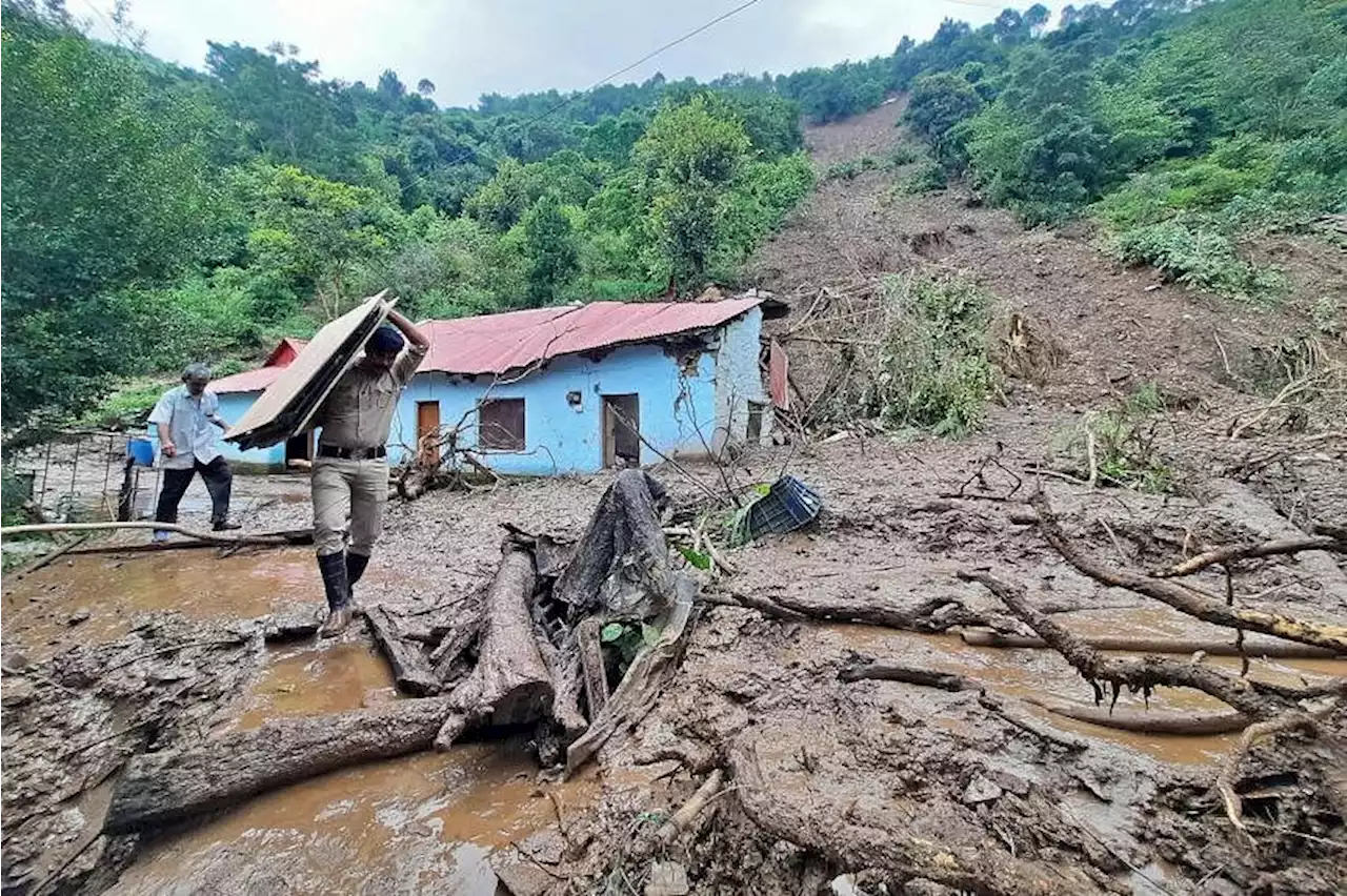 Search for survivors after Indian floods, landslides kill 58