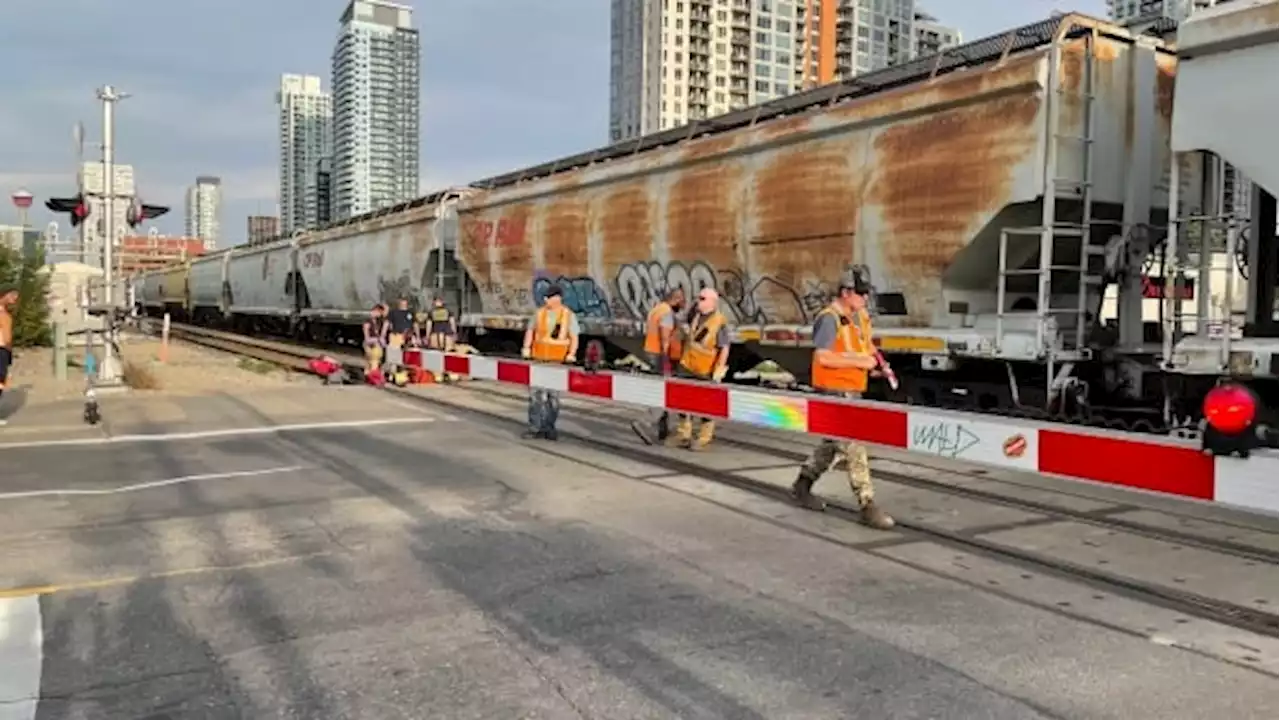 Paramedics respond to injured person at rail crossing in Calgary's Downtown West End