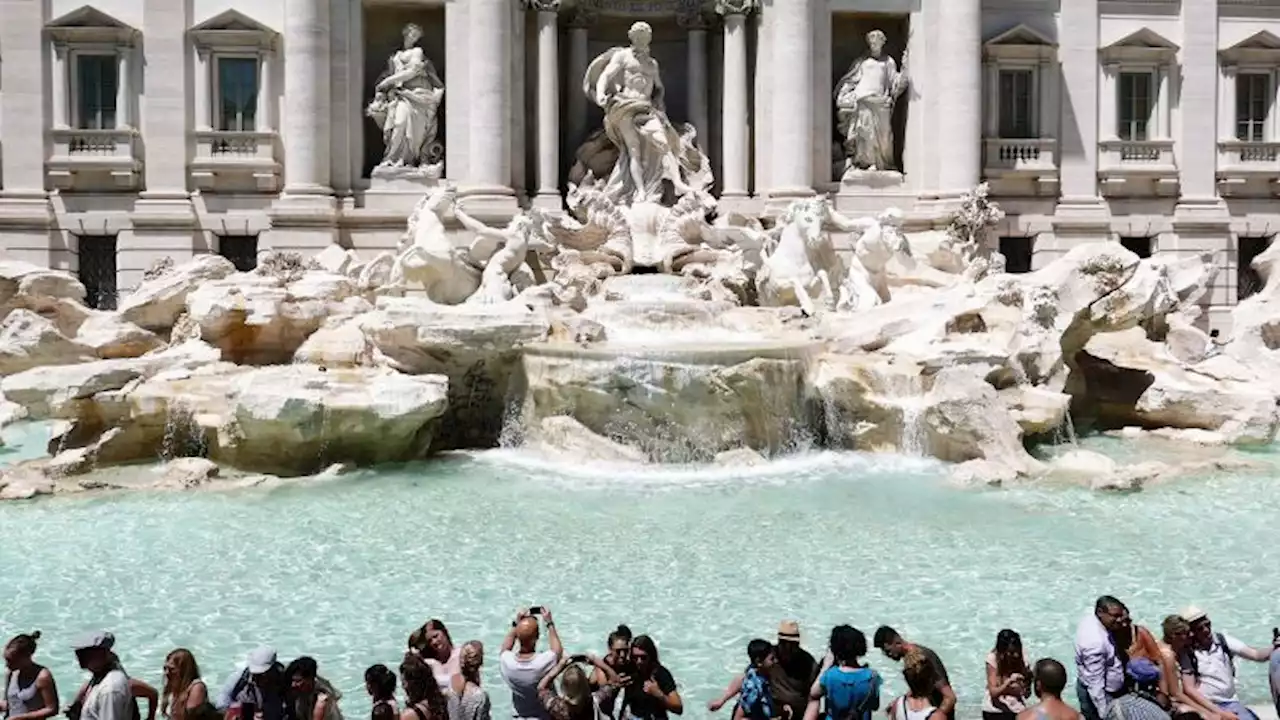 Video shows tourist climbing into Rome's Trevi Fountain to fill up water bottle