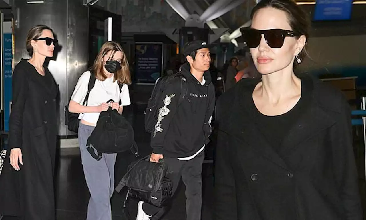 Angelina Jolie looks chic in all black as she arrives to JFK airport