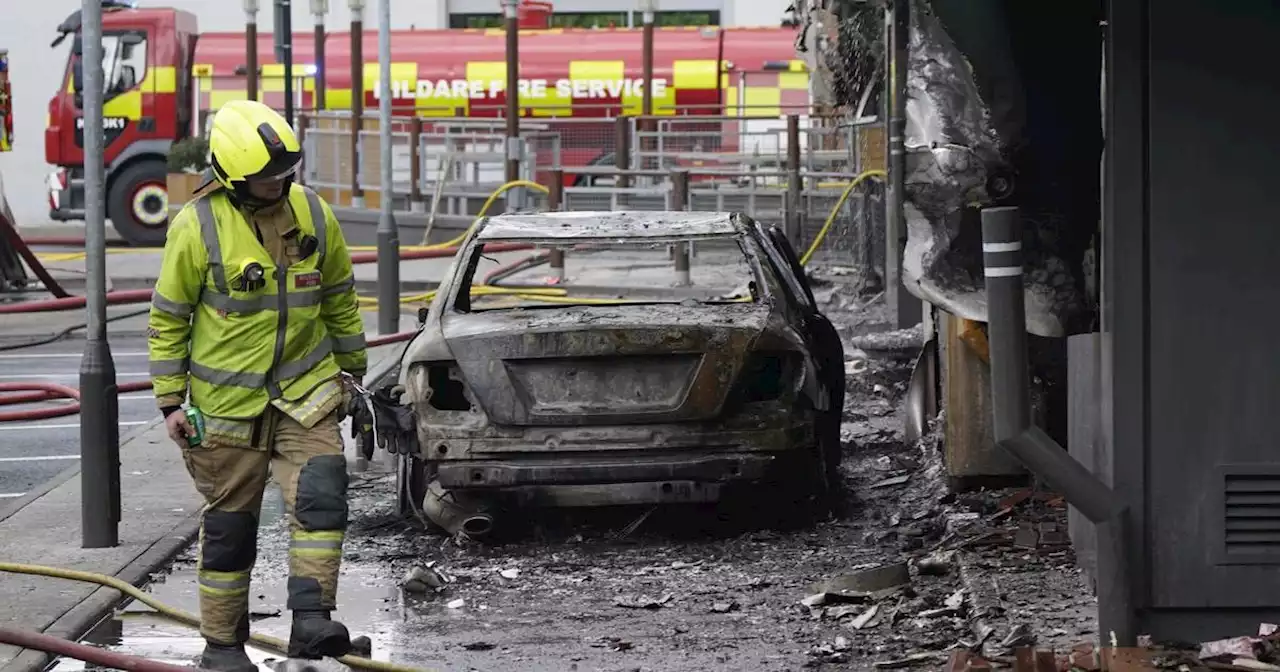 Woman unharmed as car bursts into flames at McDonald’s in Newbridge