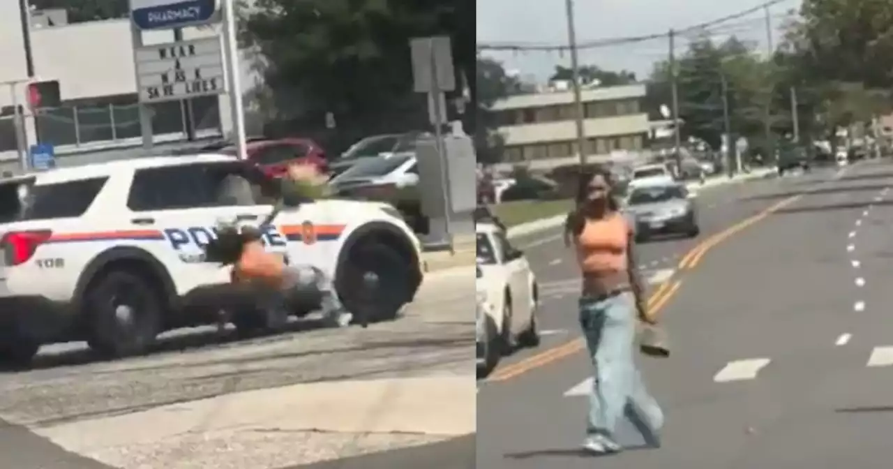 En video| Carro de policía atropella a una mujer en plena vía: se salvó de milagro