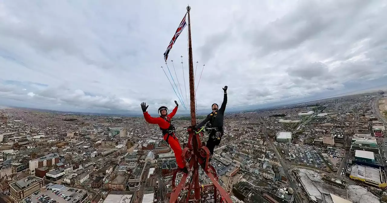 Thrill-seekers scale 518ft Blackpool Tower for stunning Red Arrows selfie