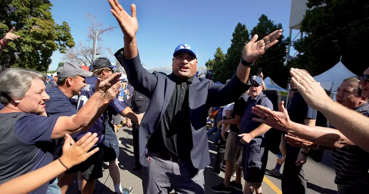 The story behind Kalani Sitake’s Heisman Trophy T-Shirts