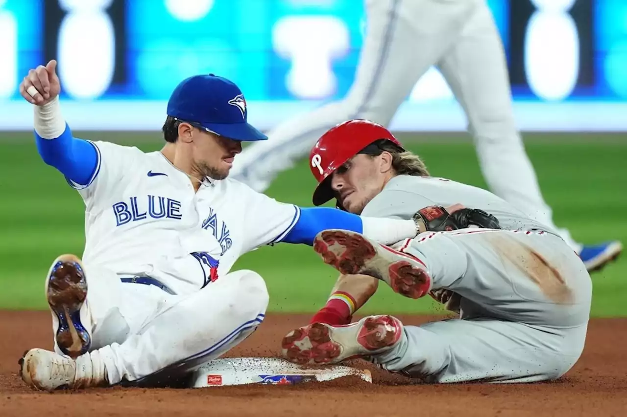 Biggio's plunk lifts Blue Jays over Phillies 2-1; Romano earns 29th save in return