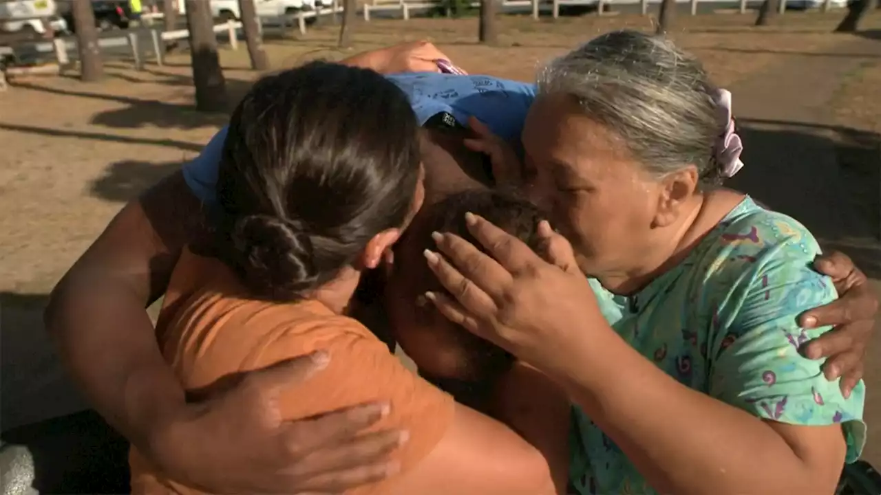 Woman reunites with stranger who carried her on his back to evacuate Maui wildfires