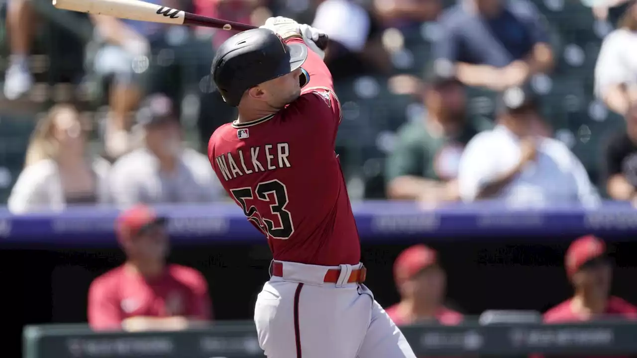 Walker homers twice, hitting 2-run shot in 8th in Diamondbacks' 9-7 victory over Rockies