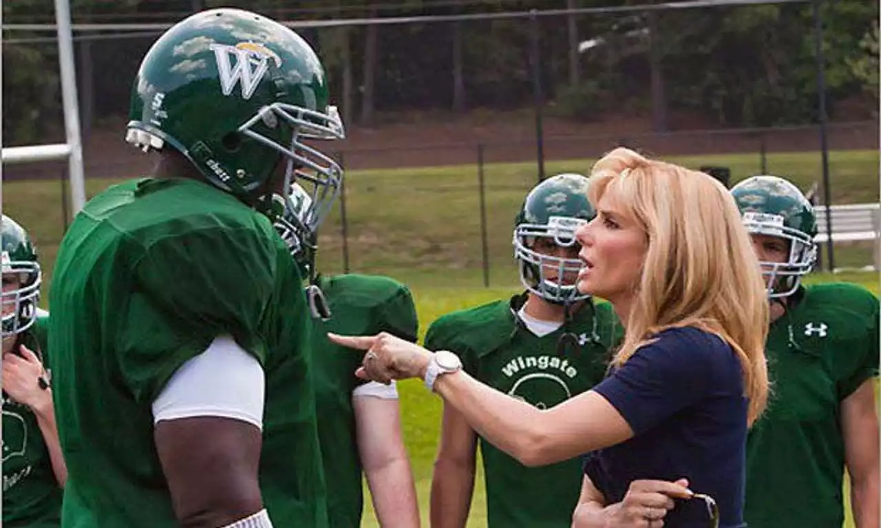 The subject of Hollywood film 'The Blind Side' says he was tricked by the couple who 'adopted' him