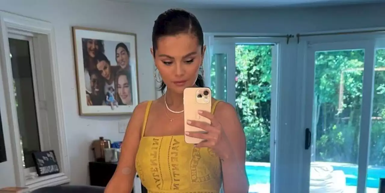 Selena Gomez Debuts a Dreamy Late Summer Look With a Yellow Dress and Lemon-Shaped Bag