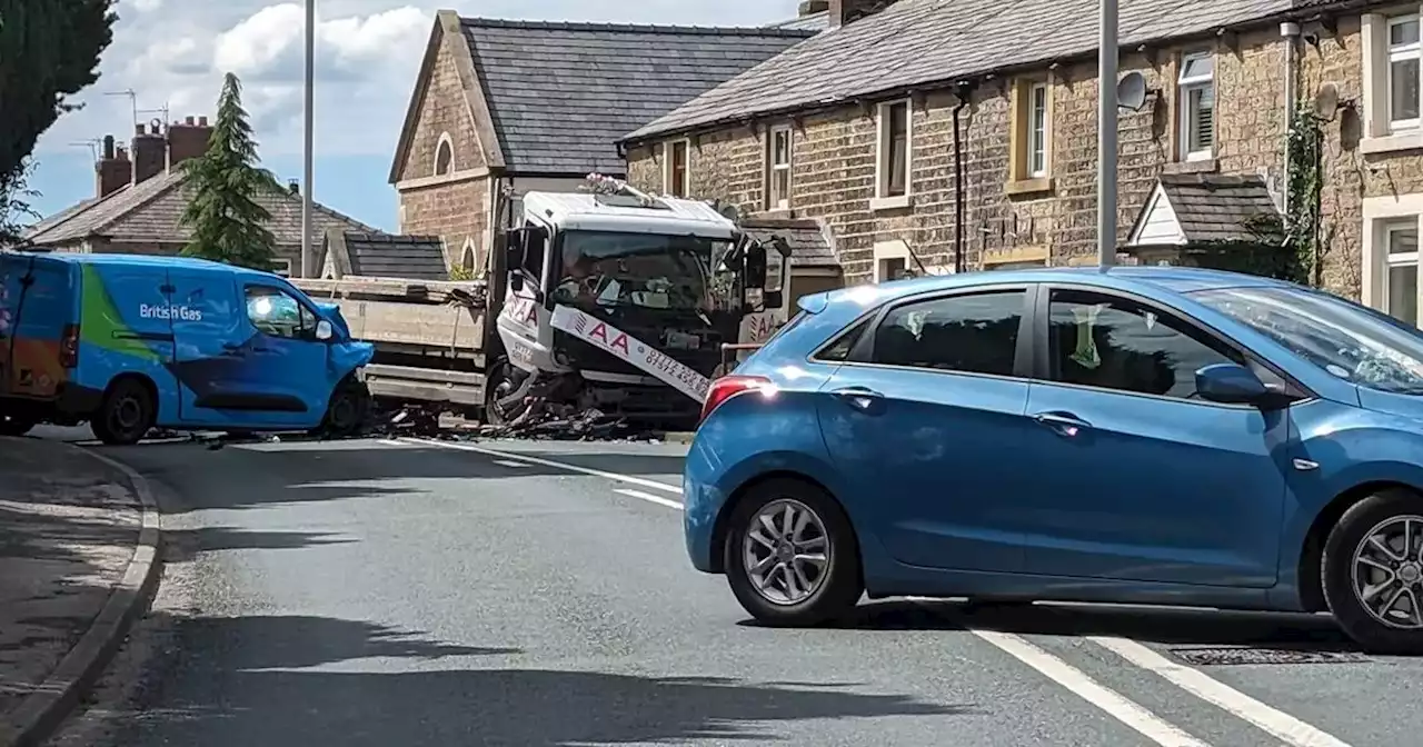 Crash between British Gas van and lorry leaves busy road blocked