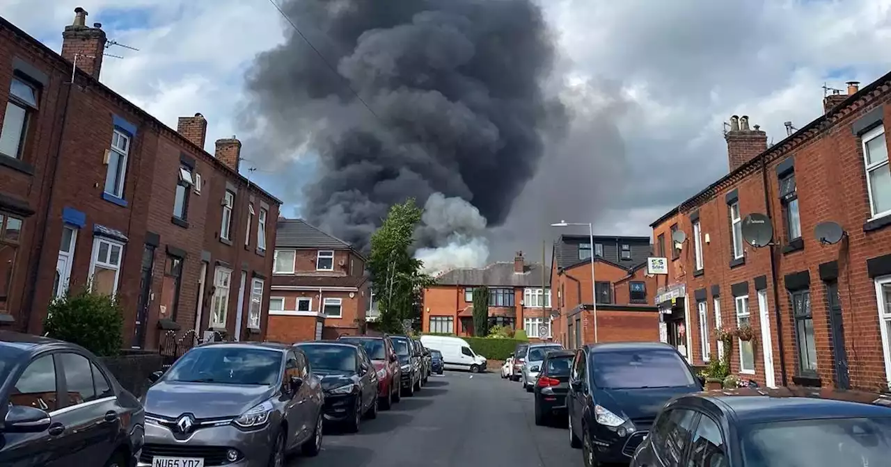 LIVE: Scores of fire crews descend on primary school as roof goes up in flames