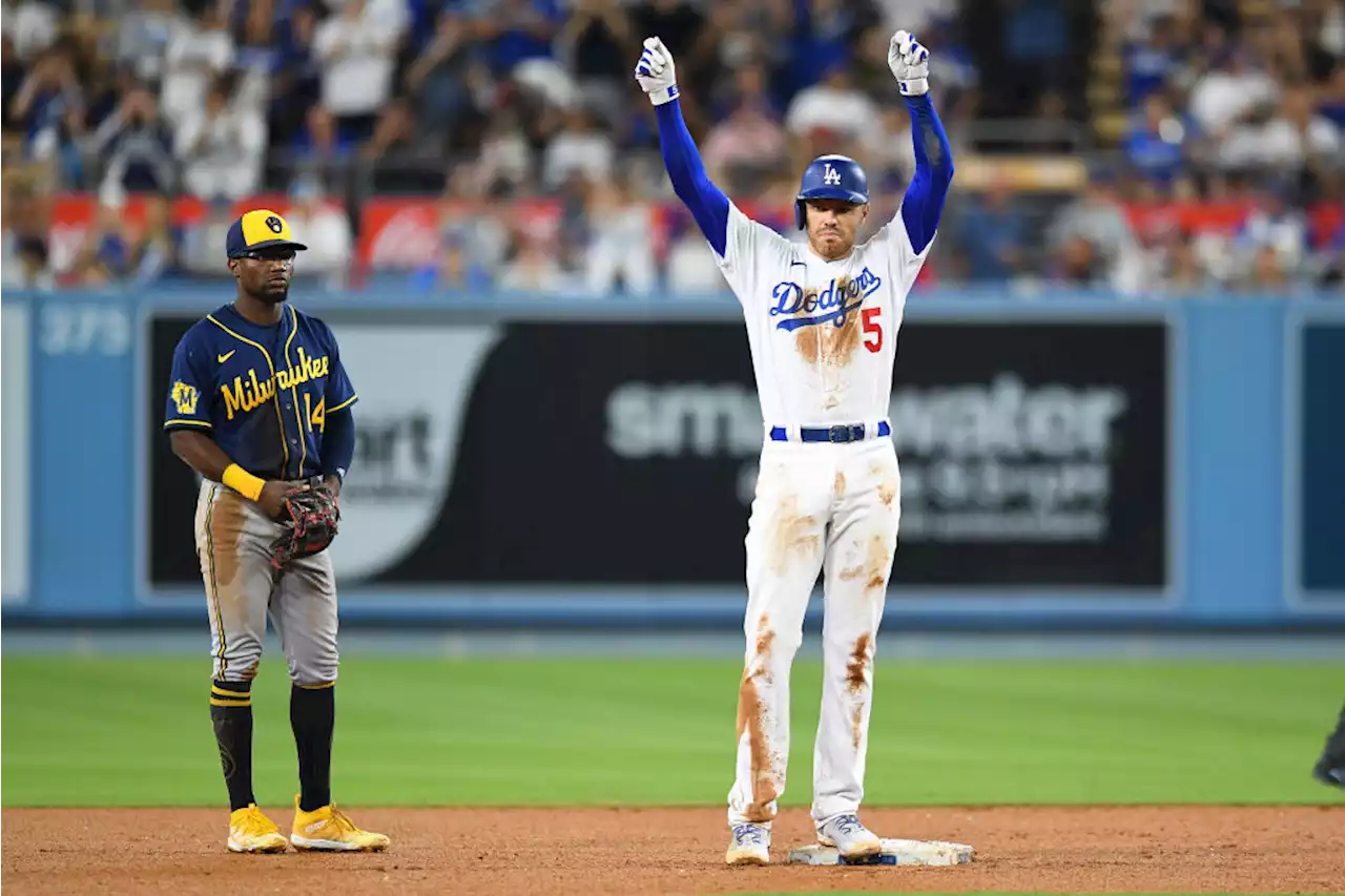 Two catcher's interference calls help Dodgers beat Brewers 7-1 for 10th straight win