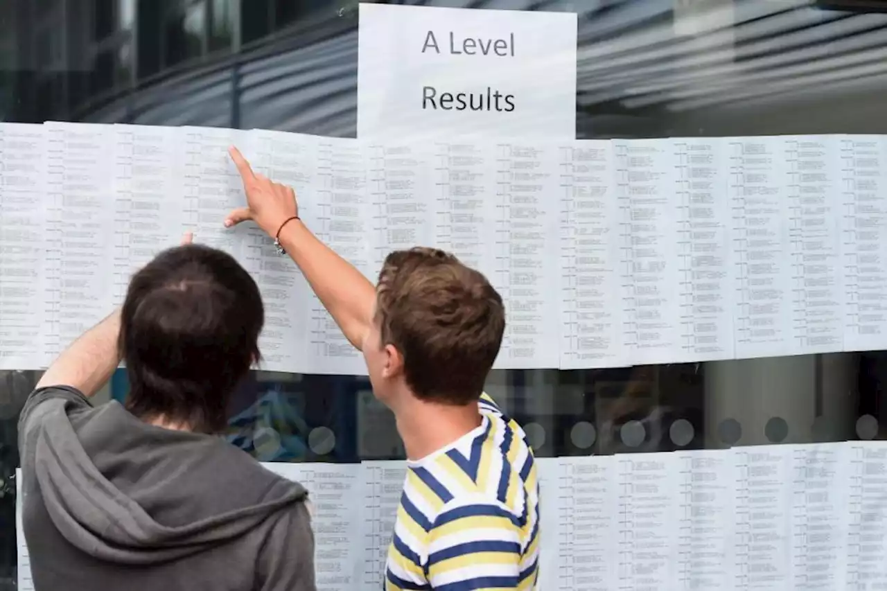 Students receive A-level results as ministers aim to return to pre-Covid grading