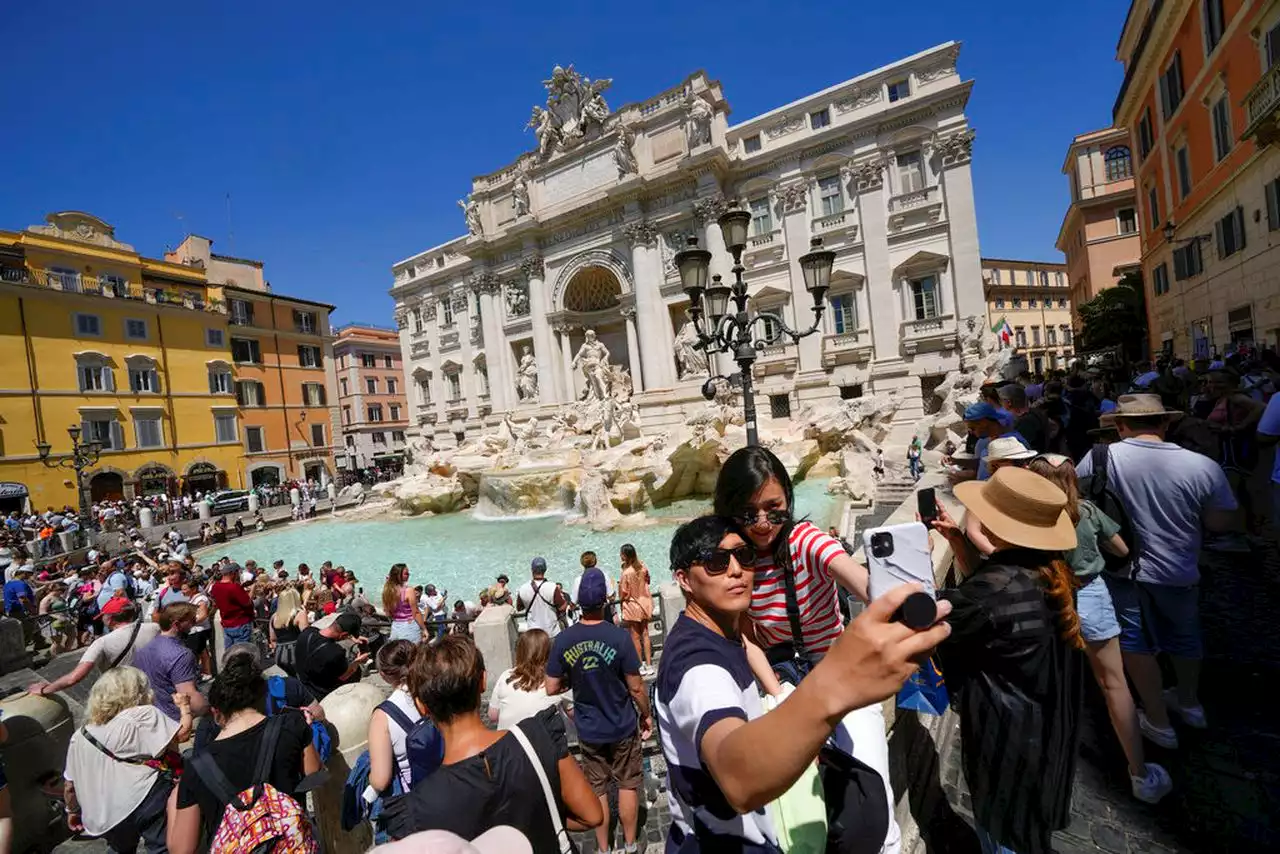 Tourist seen on video climbing into Rome’s Trevi Fountain to fill up water bottle: reports