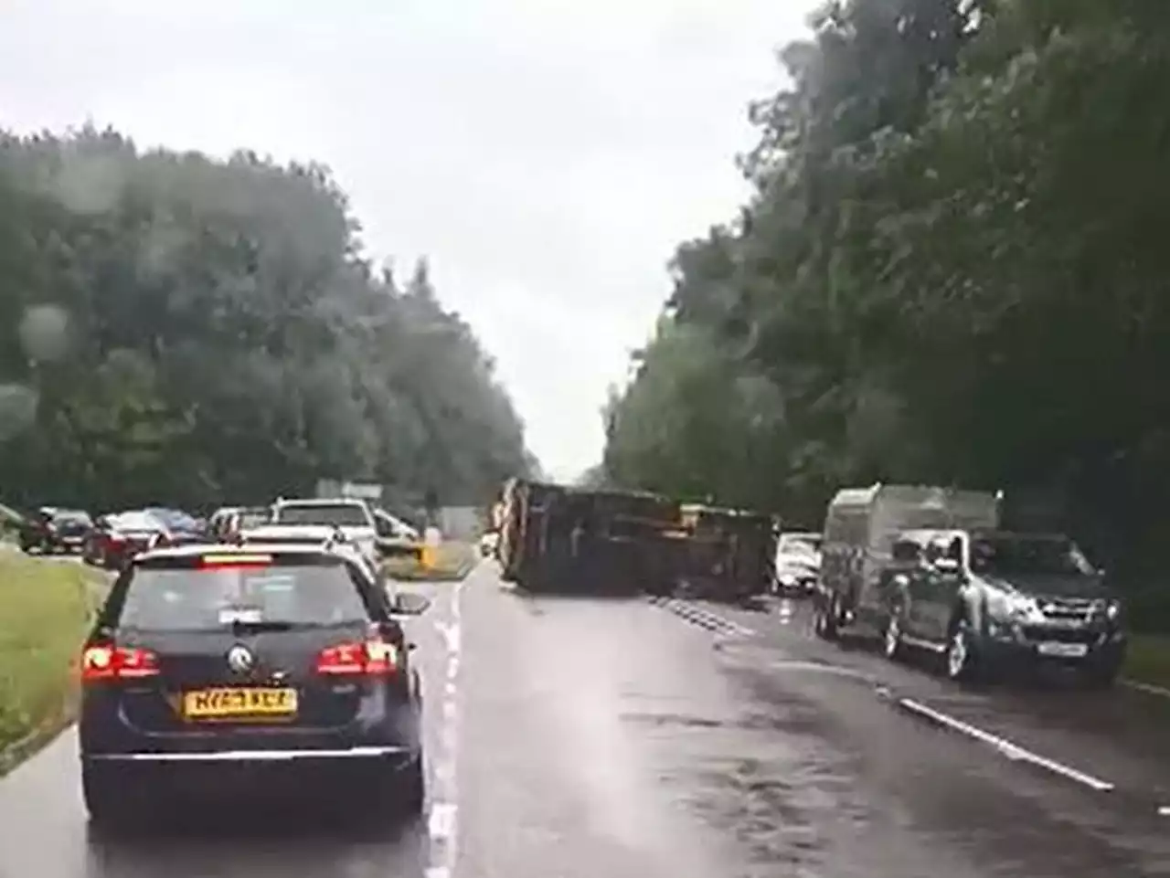 Scaffold lorry ends up on its side after crashing with three cars on A49 at Ludlow