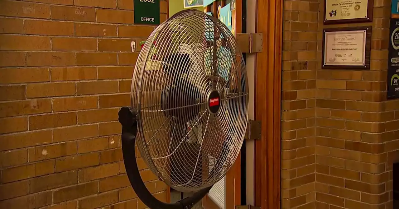 Inside the rush to get air conditioning in schools amid record heat