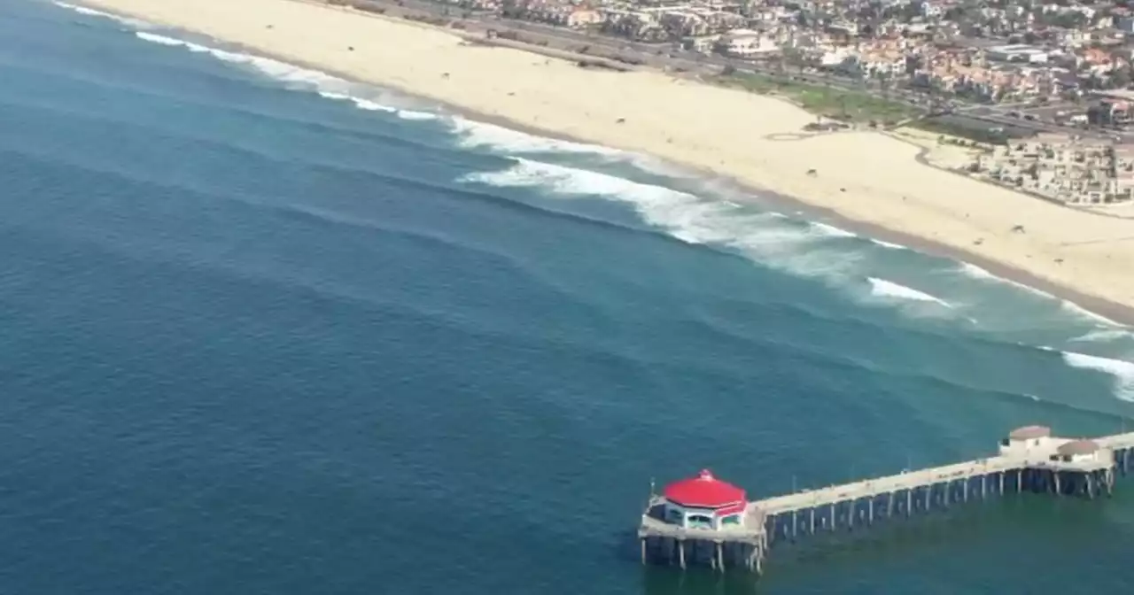 Huntington Beach ocean warning issued as 'sheen' in water is investigated