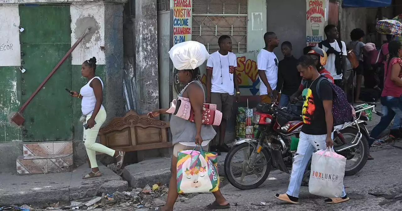 Haiti aid groups halt operations as thousands flee gang warfare