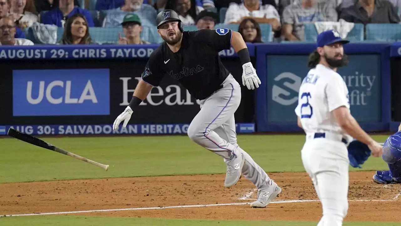 The Marlins slug 5 homers and snap the Dodgers' 11-game winning streak with an 11-3 victory